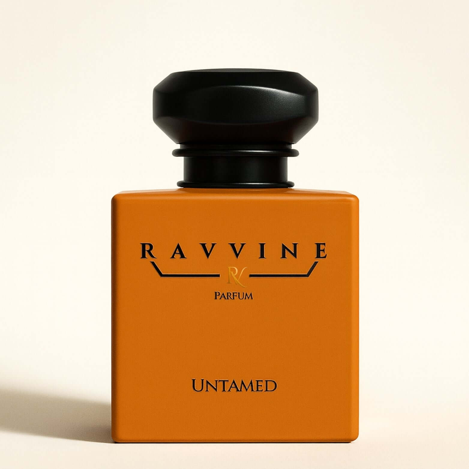 UNTAMED perfume bottle by Ravvine, showcasing bold and fresh fragrance notes.